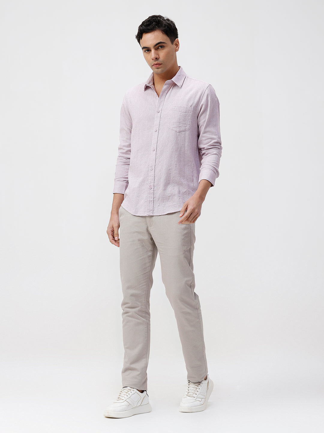 Man wearing a red rib textured cotton shirt light purple on a light gray background