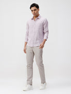 Man wearing a red rib textured cotton shirt light purple on a light gray background