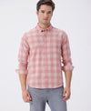 Man wearing a pure cotton cozy checks shirt with casual styling on a gray background