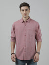 Man wearing a red red striped full sleeve linen casual shirt with casual styling on a gray background