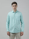 Man wearing a blue aqua blue striped full sleeve 100% cotton shirt on a light gray background