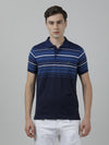 Man wearing a blue striped casual polo t shirt blue on a light gray background