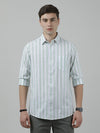 Man wearing a green casual green striped full sleeve 100% cotton shirt with casual styling on a gray background