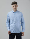 Man wearing a blue sky blue printed full sleeve 100% cotton shirt with casual styling on a gray background