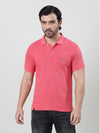 Man wearing a red red striped polo t shirt on a light gray background