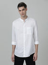 Man wearing a white off white solid full sleeve shirt on a light gray background