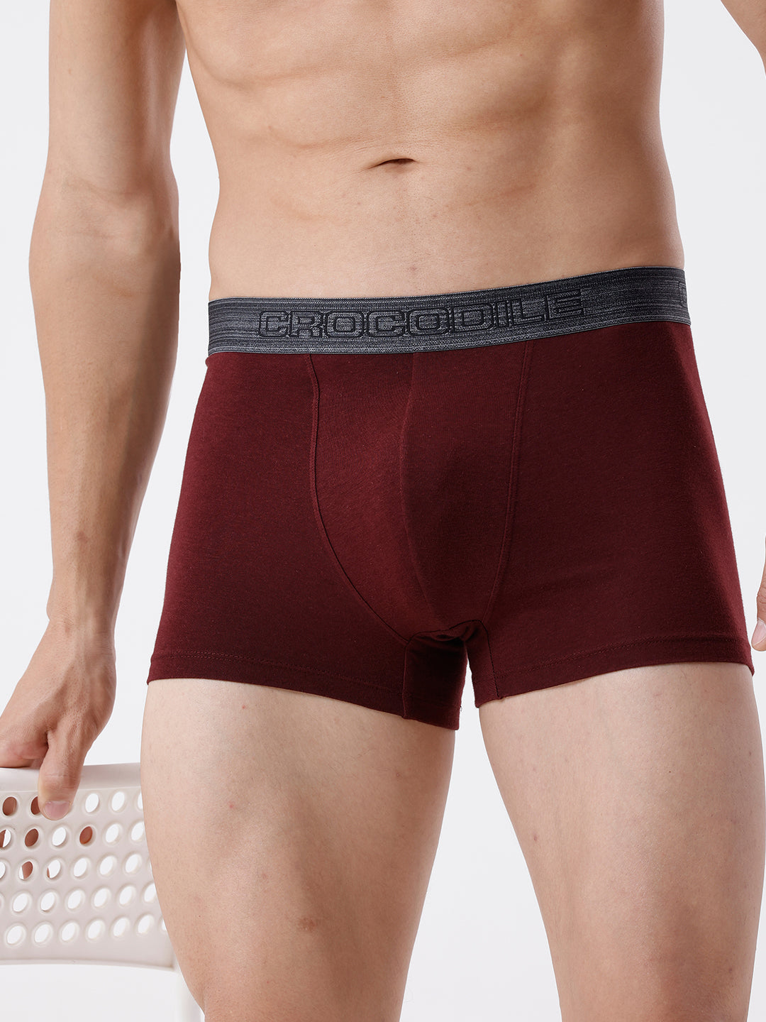 Maroon boxer briefs with a Crocodile brand waistband on a plain background