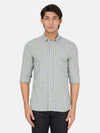 Man wearing a blue light blue checked full sleeve 100% cotton shirt on a light gray background