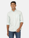 Man wearing a green mint green solid full sleeve 100% cotton shirt on a light gray background