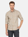 Man wearing a brown khaki brown checked full sleeve casual shirt on a light gray background