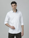 Man wearing a white white solid full sleeve shirt with casual styling on a gray background