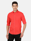Man wearing a red red solid full sleeve linen shirt with casual styling on a gray background
