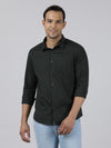 Man wearing a green green striped full sleeve 100% cotton casual shirt on a light gray background