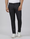 Man wearing a black black solid casual trouser with casual styling on a gray background