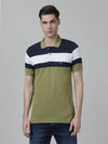 Man wearing a green striped olive green casual polo t shirt with casual styling on a gray background