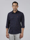 Man wearing a navy printed navy full sleeve 100% cotton casual shirt with casual styling on a gray background