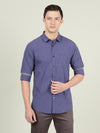 Man wearing a brown brown checked full sleeve 100% cotton casual shirt with casual styling on a gray background