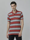 Man wearing a red red casual striped polo t shirt with casual styling on a gray background