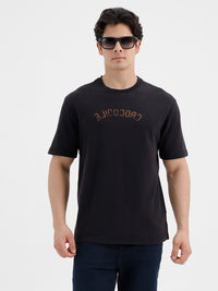 Oversized Graphic T-Shirt Made From 2-Thread French Terry Featuring A Vintage Acid Wash Finish And Bold Chest Print