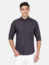 Man wearing a grey dark grey printed full sleeve 100% cotton shirt with casual styling on a gray background