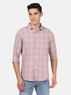 Man wearing a purple checked full sleeve shirt with casual styling on a gray background