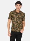 Man wearing a green olive green casual printed polo t shirt on a light gray background