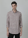 Man wearing a maroon checked casual full sleeve 100% cotton shirt with casual styling on a gray background