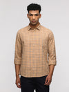 Man wearing a comfort fit sport mustard shirt for trendy looks on a light gray background