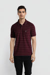Man wearing a brown brown striper polo t shirt comfort fit polo t shirt with casual styling on a gray background