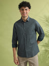 Man wearing a grey casual grey printed full sleeve 100% cotton shirt with casual styling on a gray background