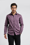 Man wearing a purple mercerized fabric satin sheen comfort fit shirts on a light gray background