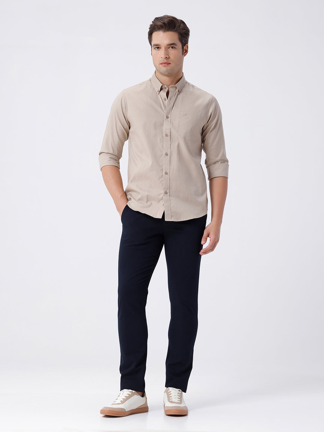 Man wearing a red textured essential chinos navy with casual styling on a gray background