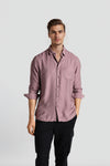 Man wearing a pink pink fluid shirt clean attire comfort fit shirts on a light gray background