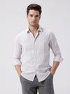 Man wearing a crepe texture stripe shirt light grape with casual styling on a gray background