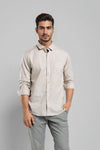 Man wearing a beige textured cozy feel cotton comfort fit beige shirts with casual styling on a gray background