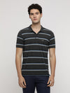 Man wearing a anthra melange classic striped polo t shirt on a light gray background