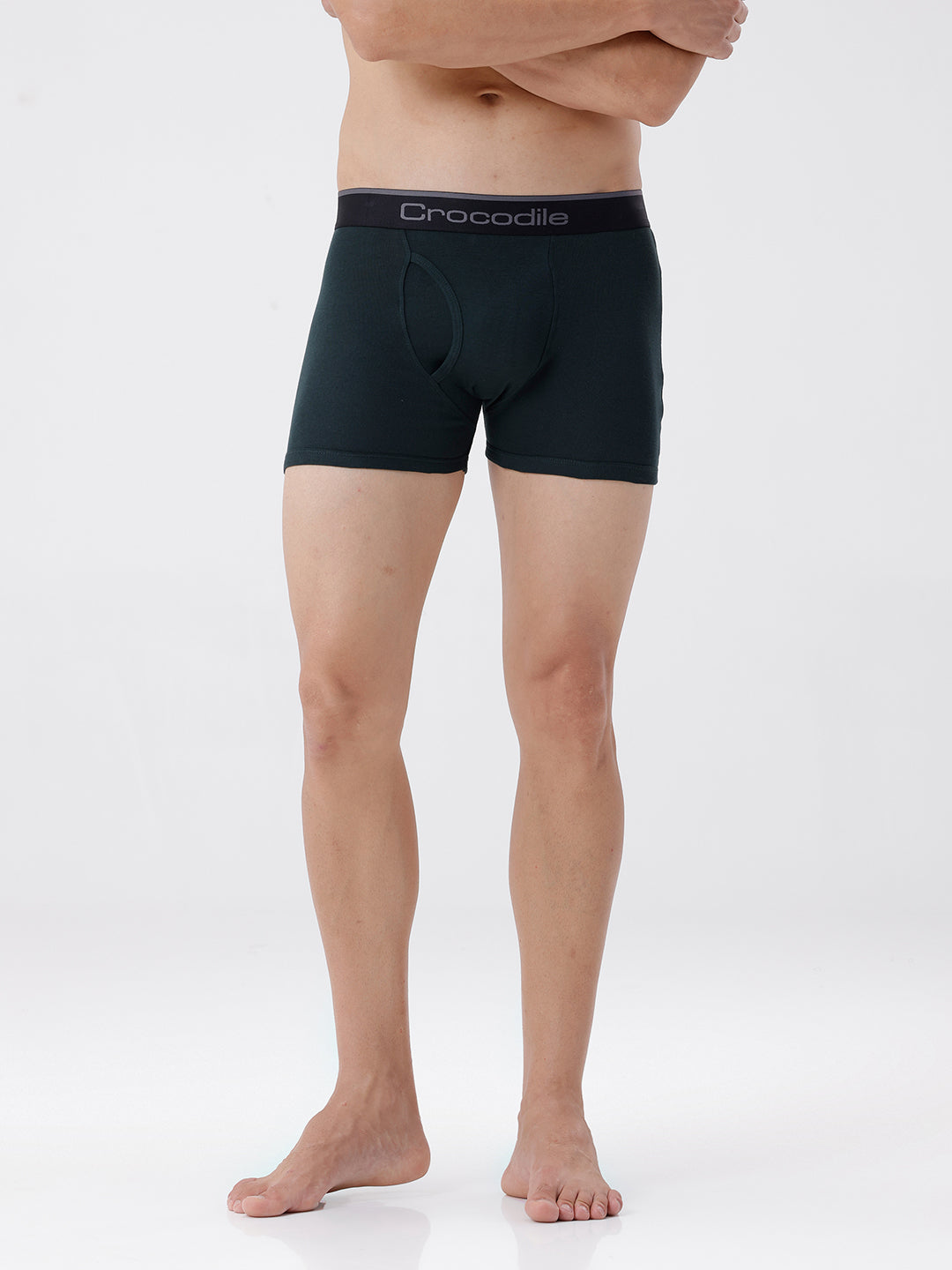 Person wearing black boxer briefs with 'Crocodile' branding on a white background