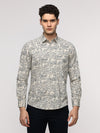 Man wearing a beige full sleeve beige shirt for casual comfort on a light gray background