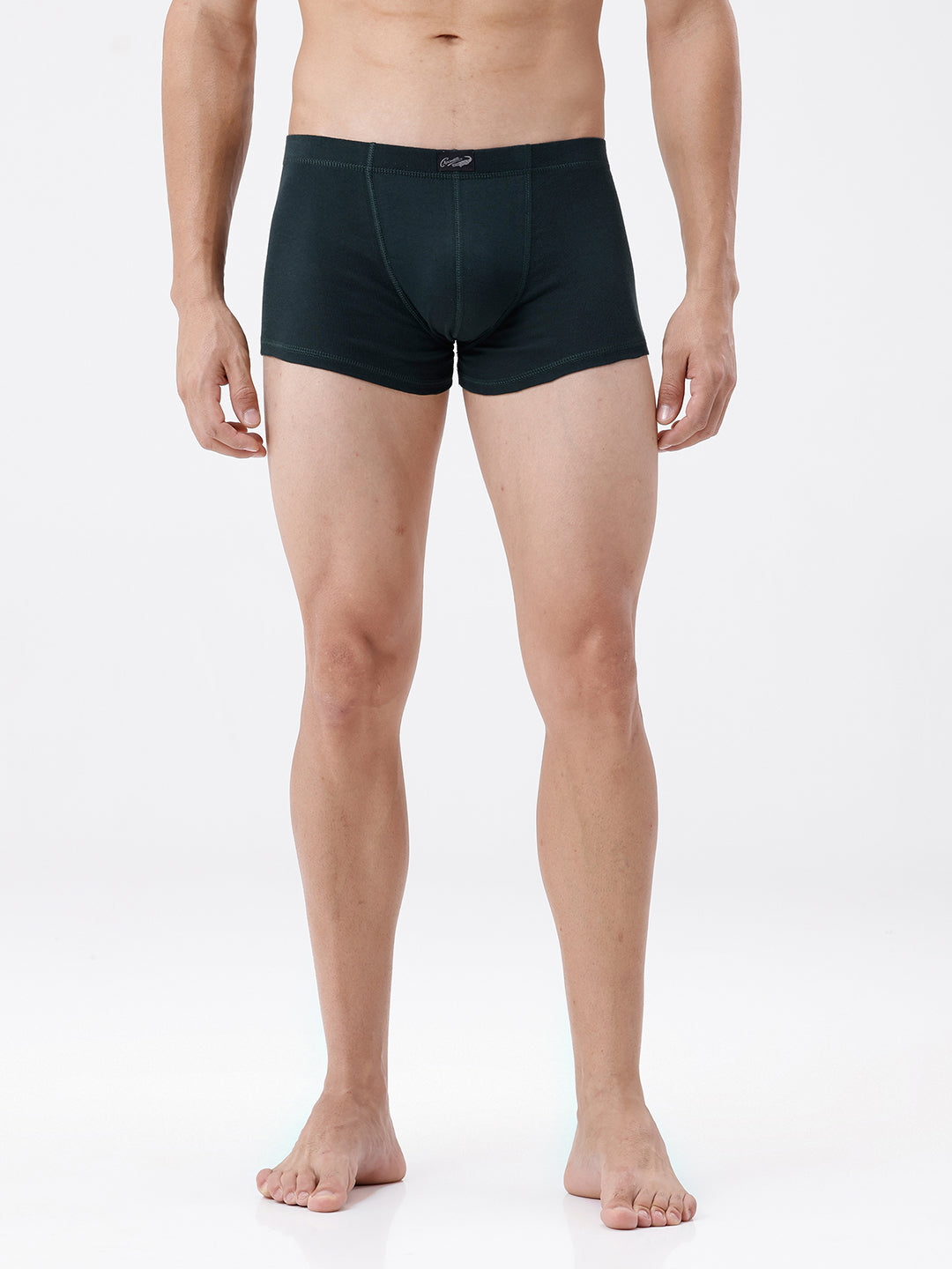 Person wearing black boxer briefs on a white background