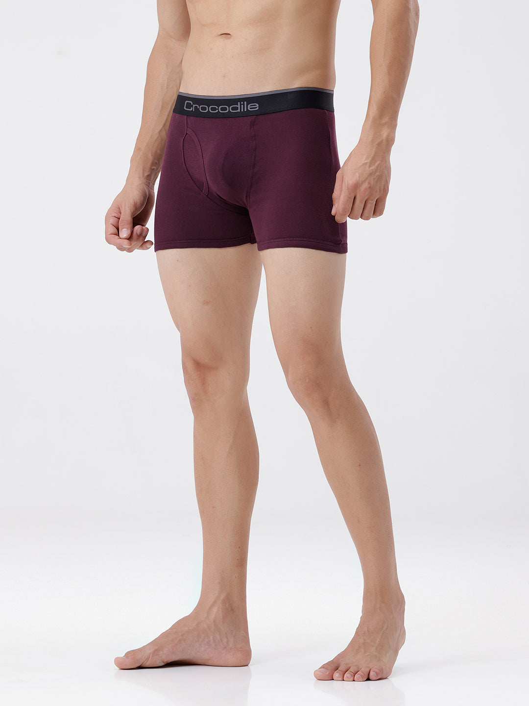 Person wearing maroon boxer briefs with 'Crocodile' branding on a white background