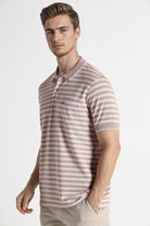 Man wearing a striped polo shirt on a white background
