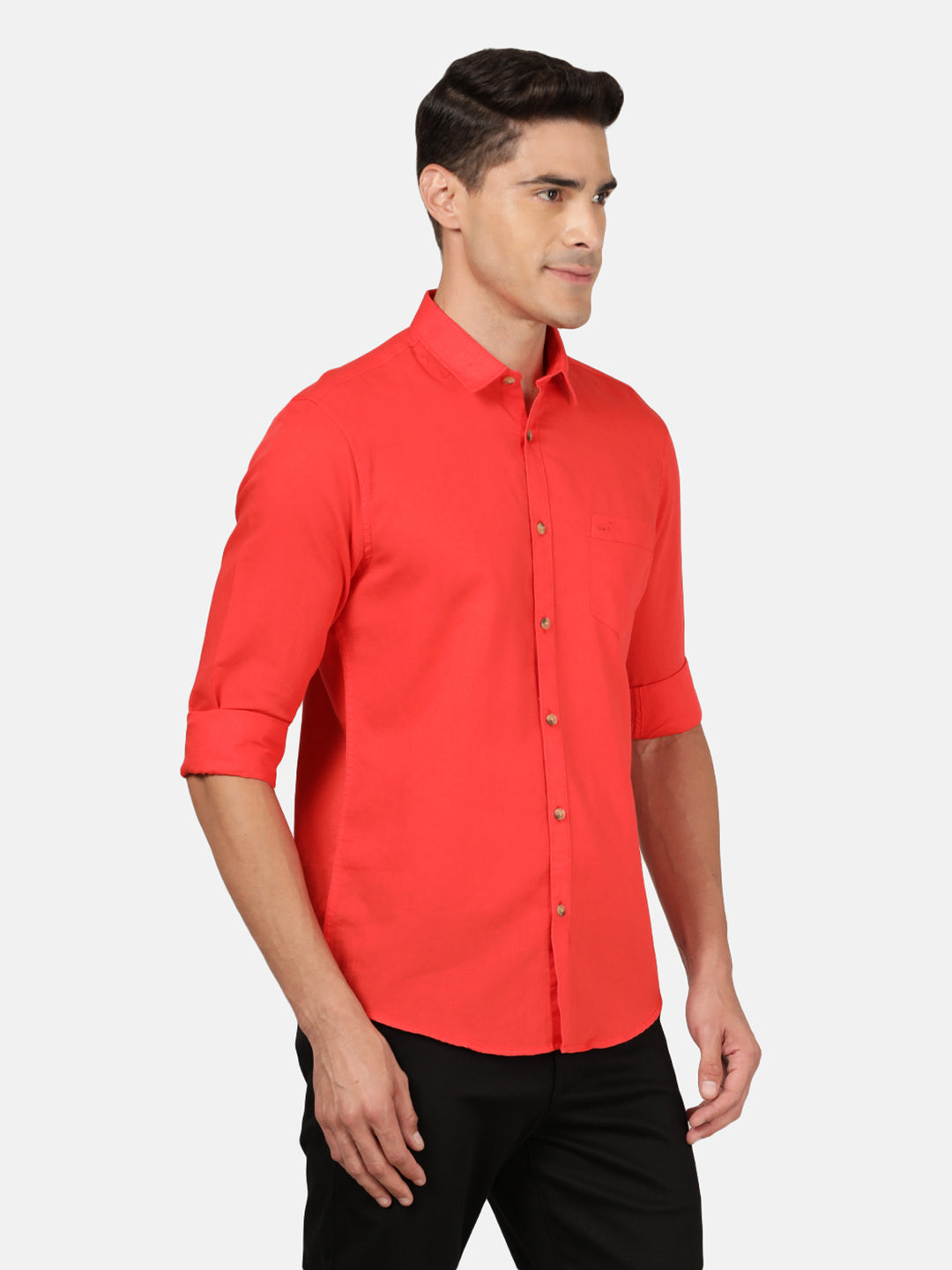Man wearing a red red solid full sleeve linen shirt with casual styling on a gray background
