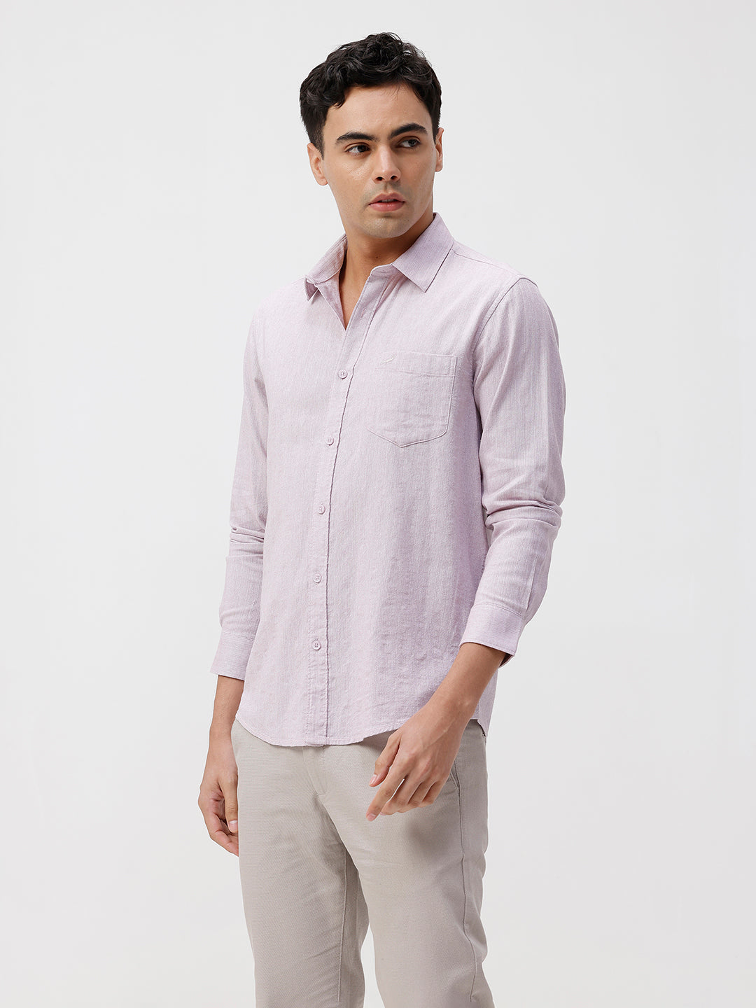 Man wearing a red rib textured cotton shirt light purple on a light gray background