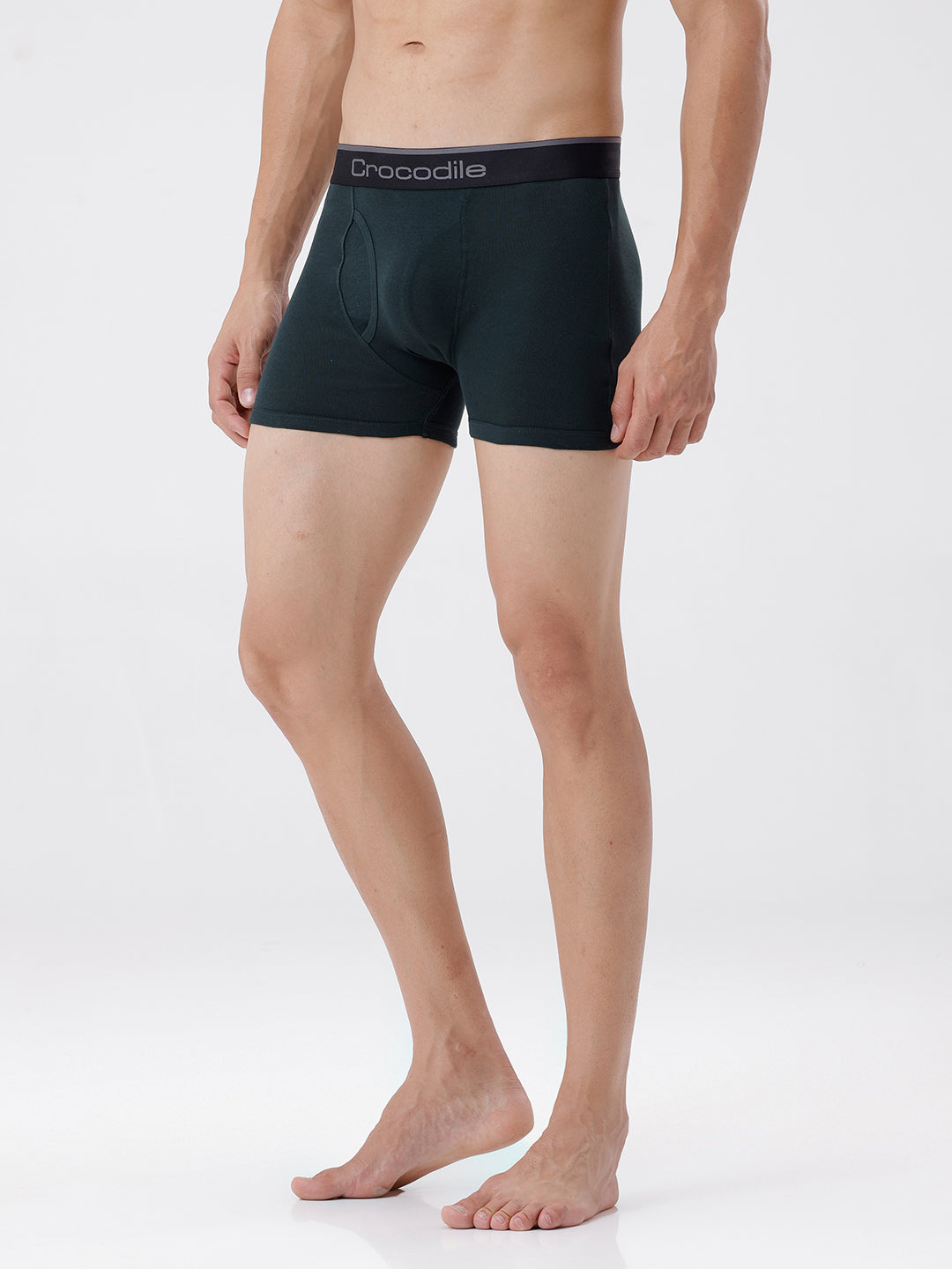 Person wearing black boxer briefs with 'Crocodile' branding on a white background