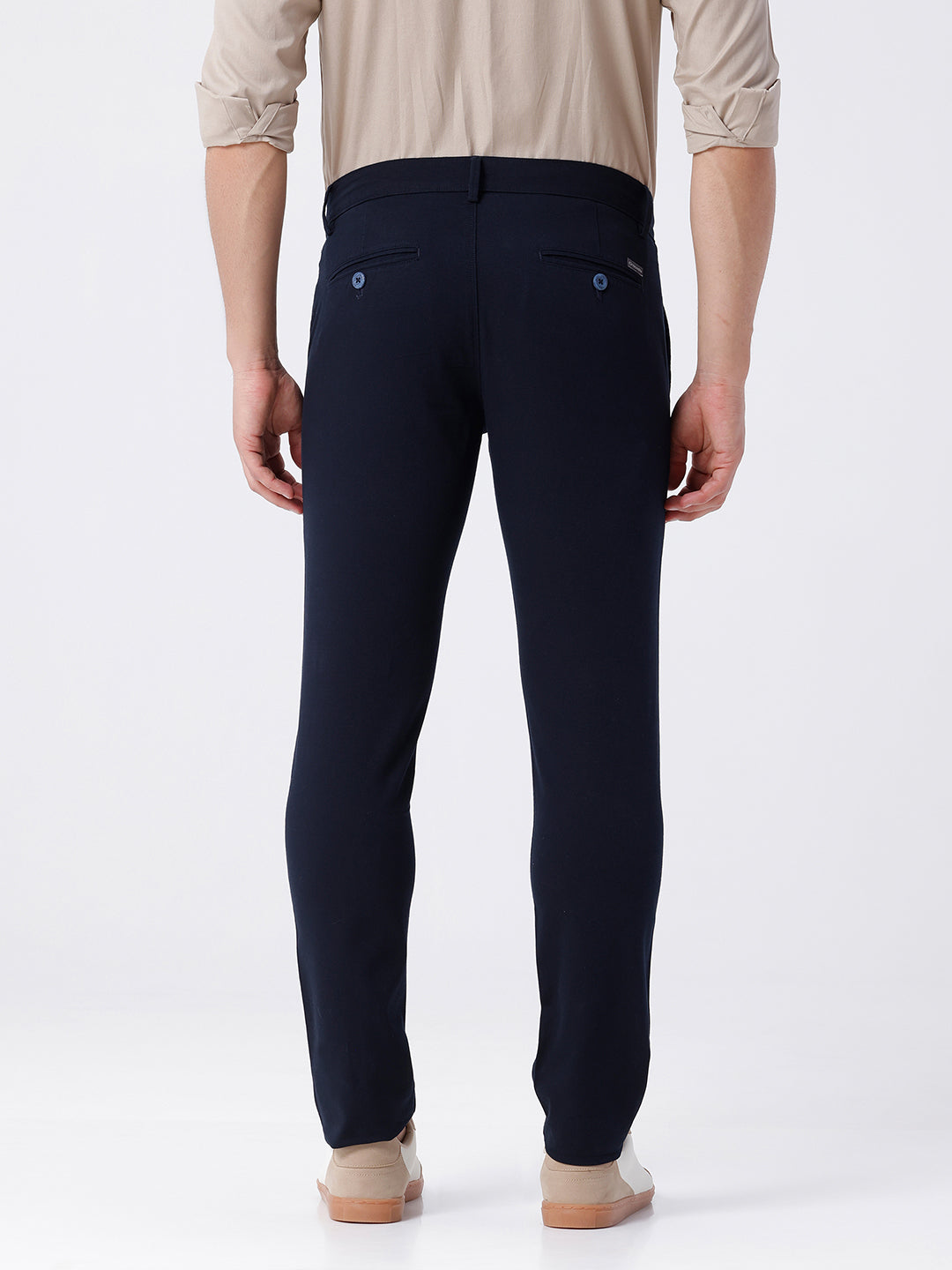 Man wearing a red textured essential chinos navy with casual styling on a gray background