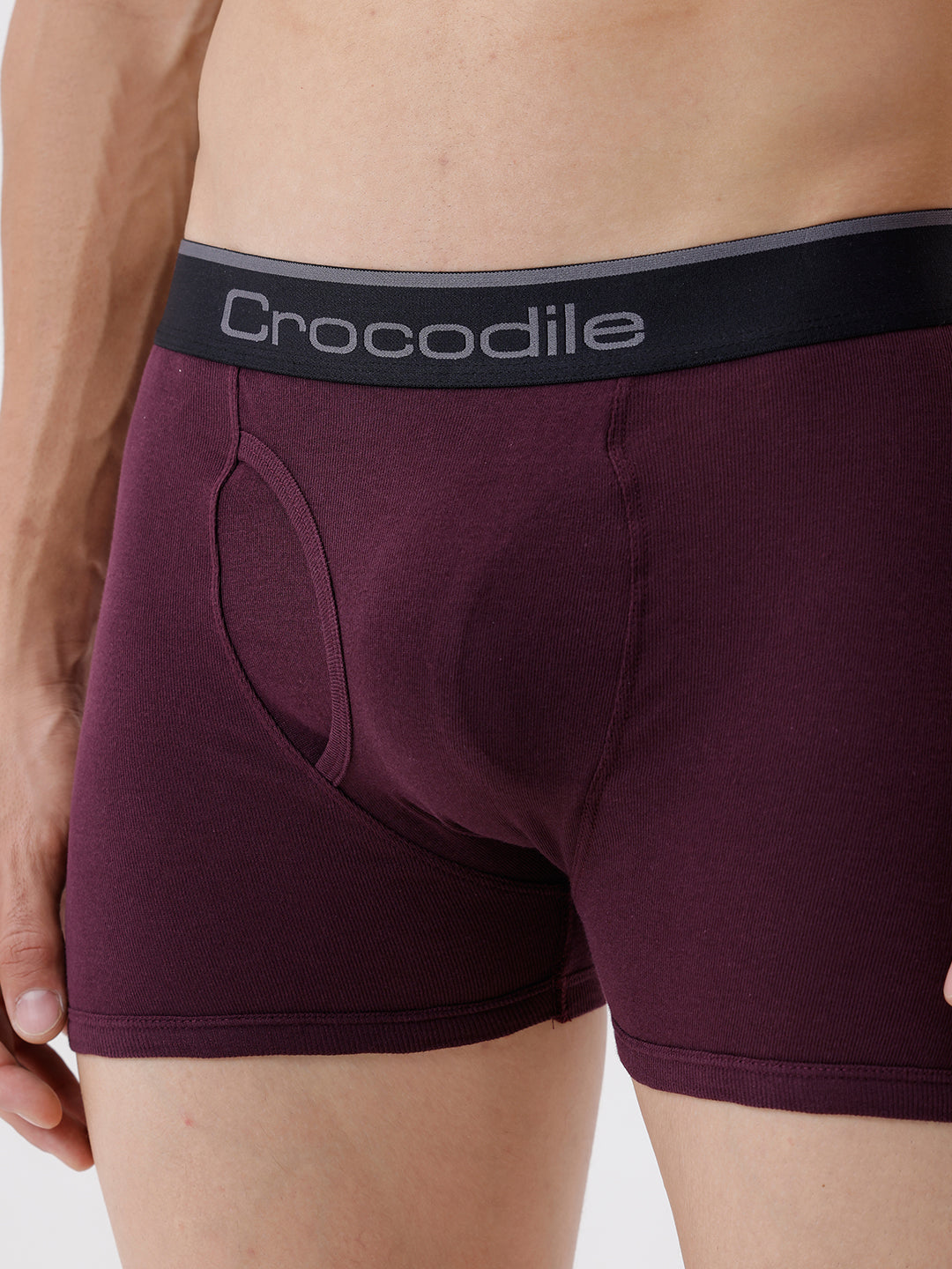 Maroon boxer briefs with a black waistband featuring 'Crocodile' branding on a neutral background.