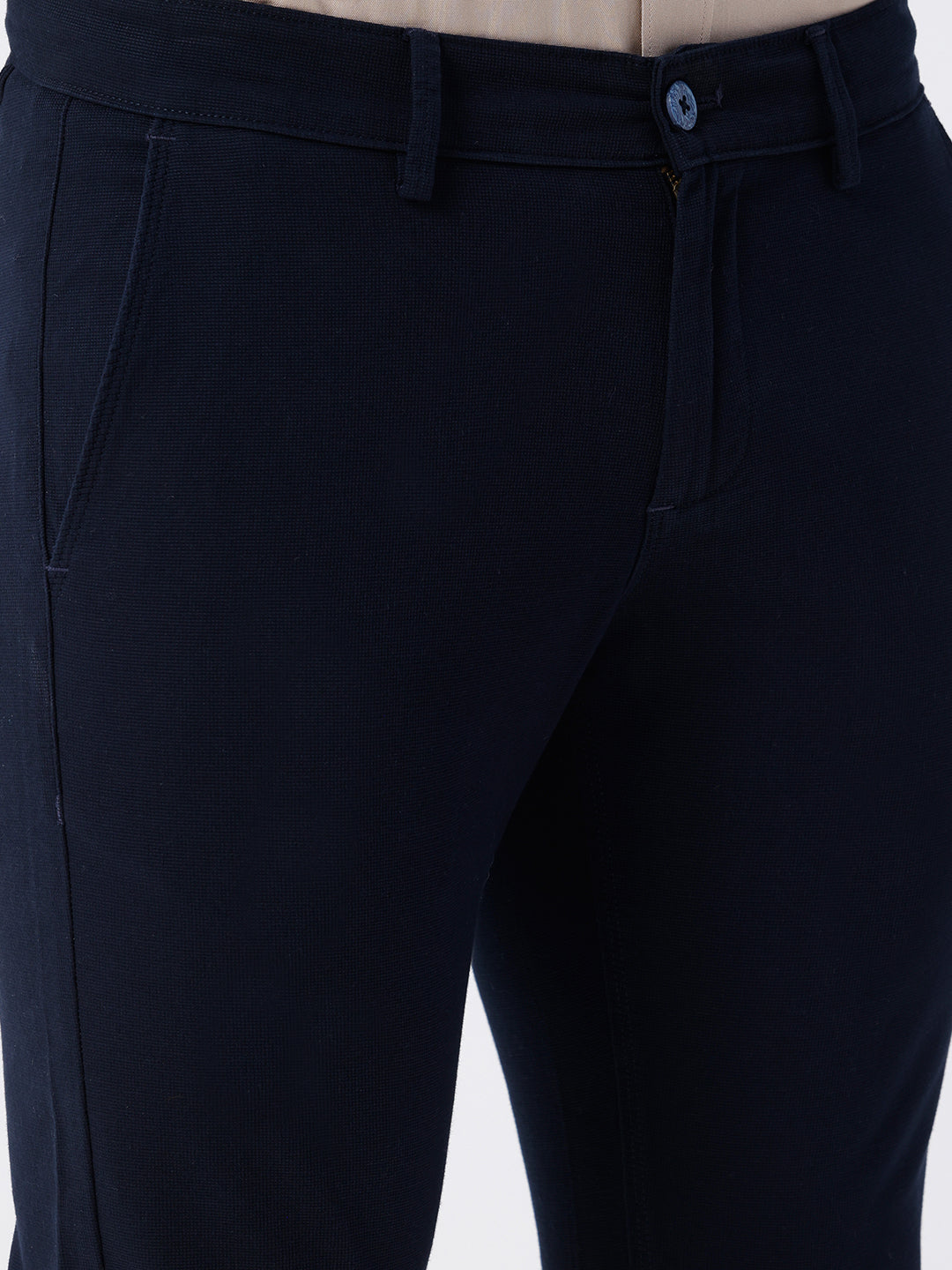 Man wearing a red textured essential chinos navy with casual styling on a gray background