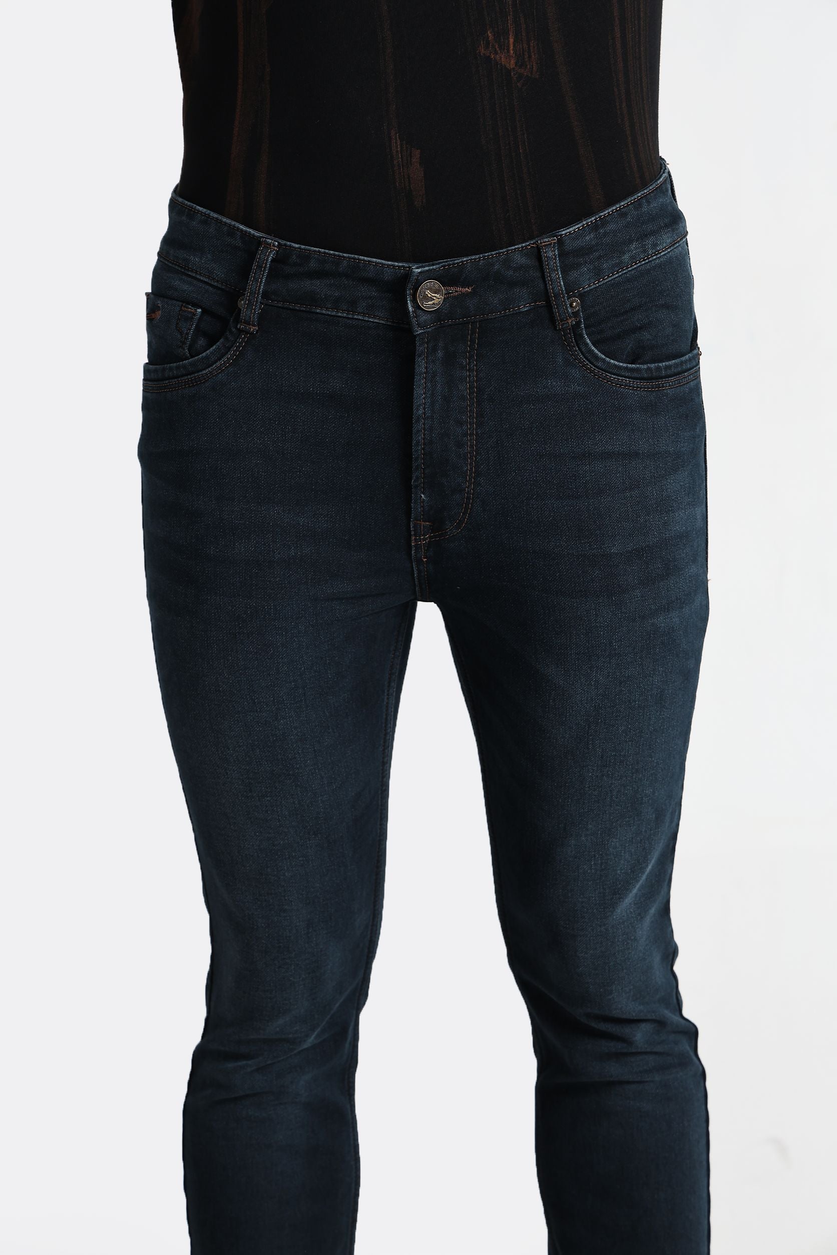 Dark blue jeans on a white background