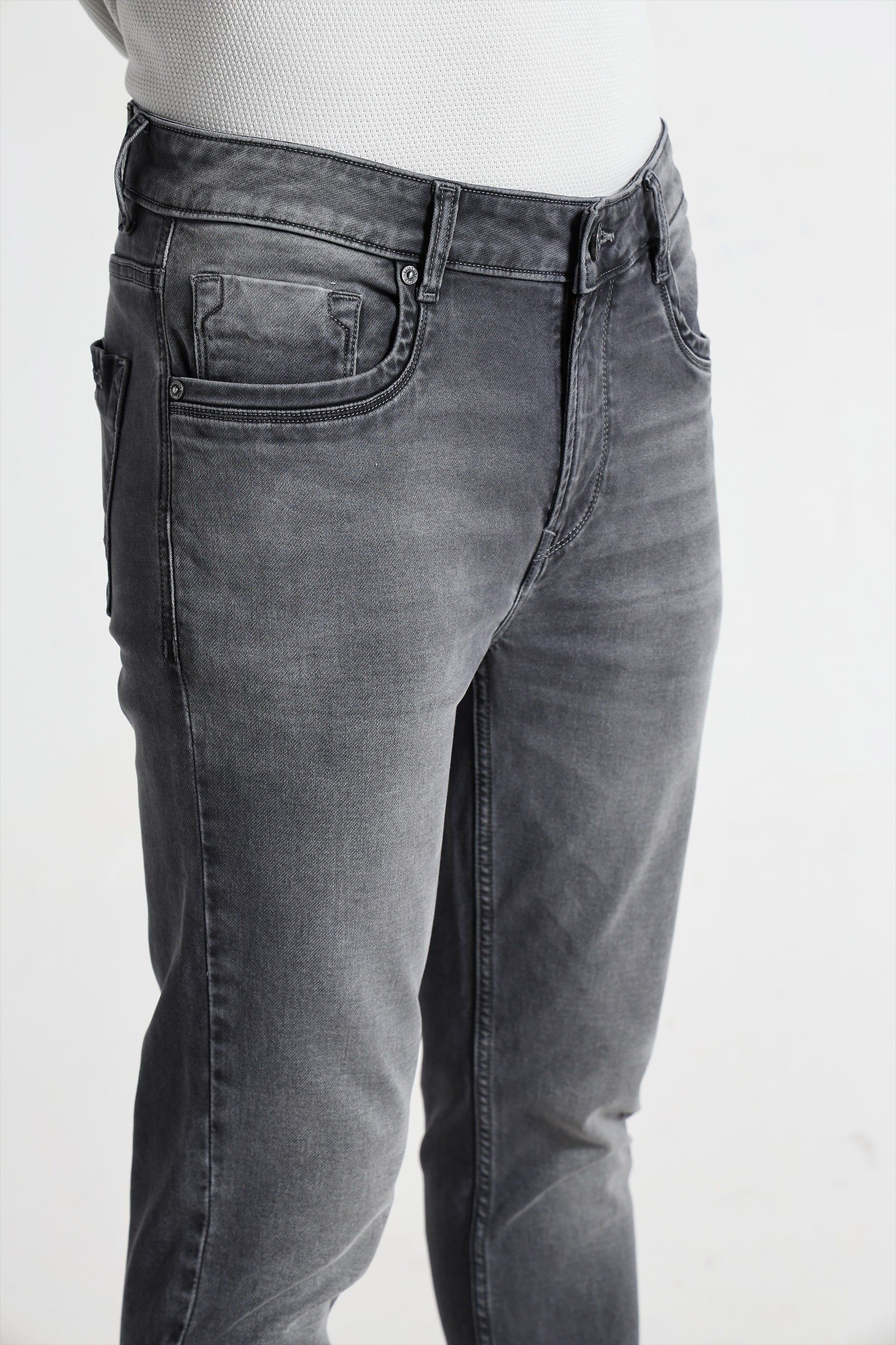 Gray jeans on a white background