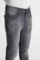 Gray jeans on a white background